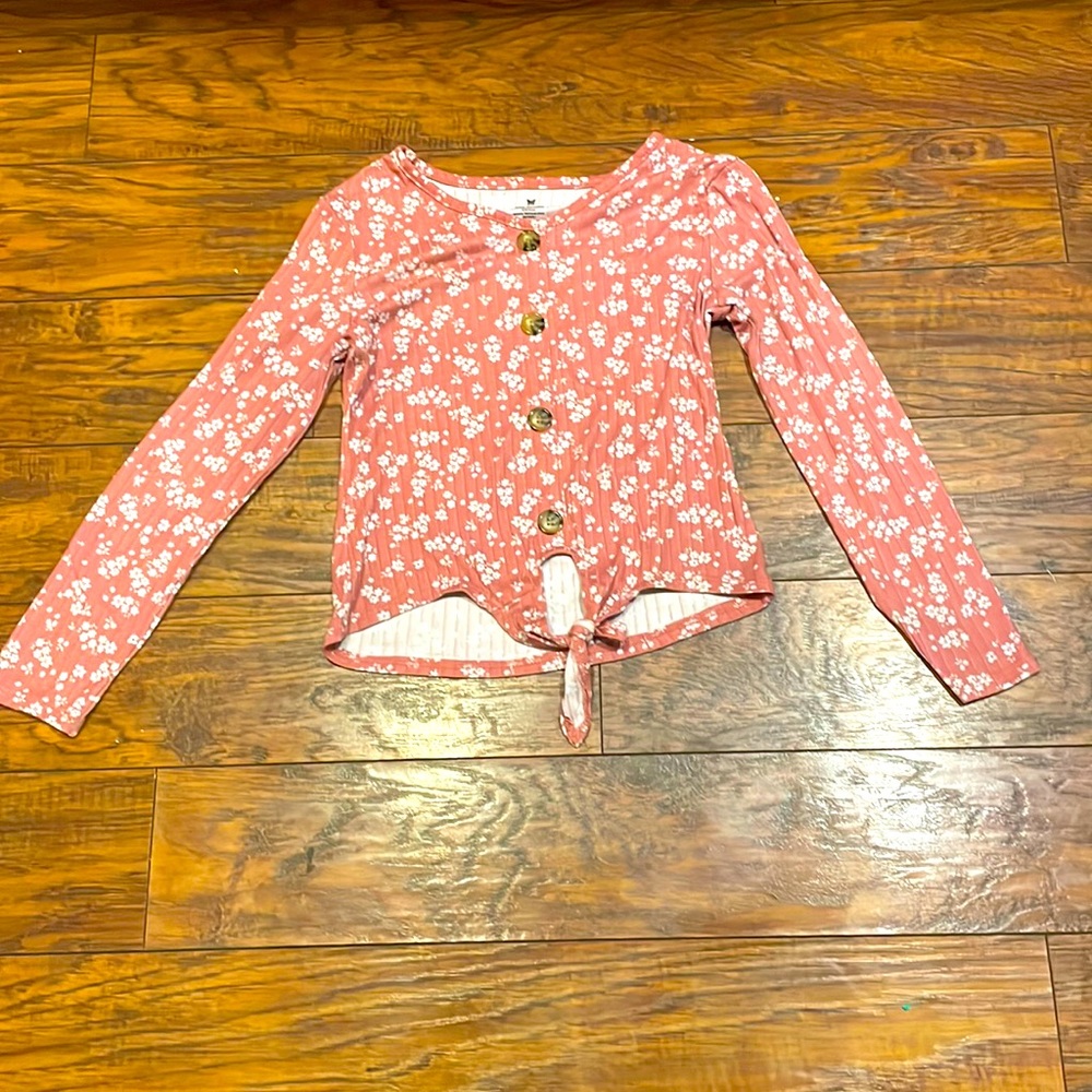 From one step up, size small pink and white